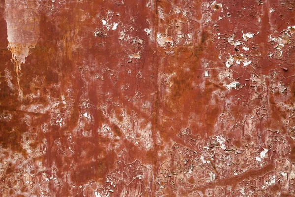Pintura vieja agrietada roja sobre fondo metálico —  Fotos de Stock