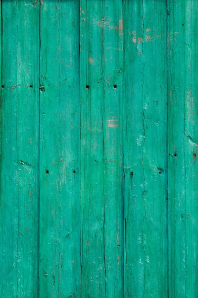 Velho verde rachado pintura no fundo de madeira Fotografias De Stock Royalty-Free