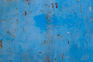 Eski kırık boya metal zemin üzerine mavi
