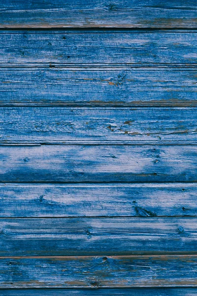 Vecchia vernice blu incrinato su sfondo di legno — Foto Stock