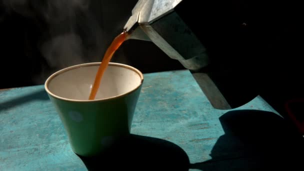 Man pouring fresh hot coffee into the mug — Stock Video