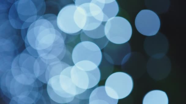 Blau, verschwommen, Bokeh Lichter Hintergrund. abstraktes Funkeln. — Stockvideo