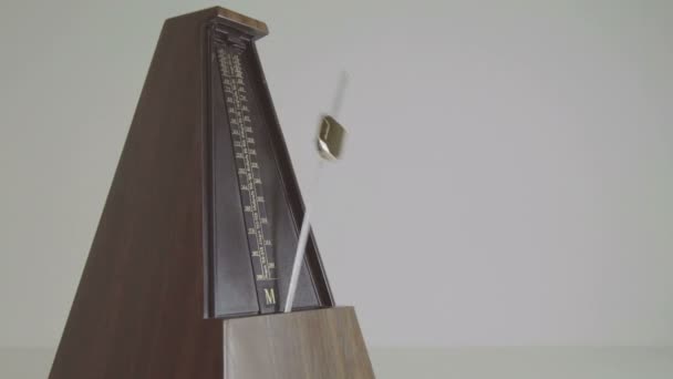 Old wooden metronome — Stock Video