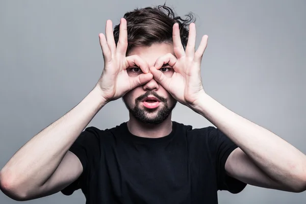 Portrait of young man in  black T-shirt — Stock Photo, Image