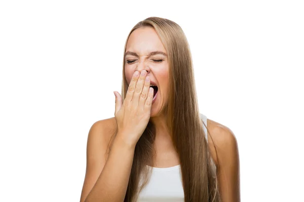 Woman yawns of boredom on white background — Stock Photo, Image