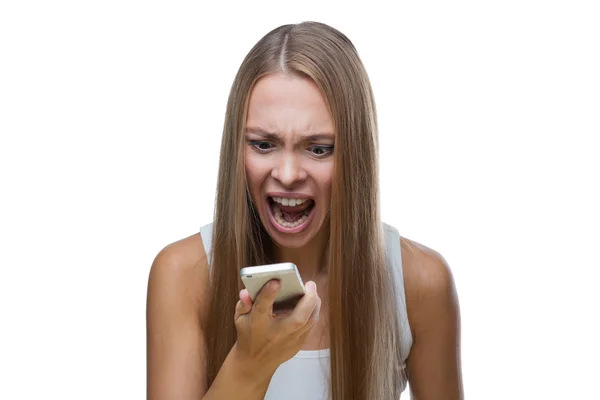 Angry woman talking on phone — Stock Photo, Image