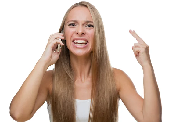 Angry woman talking on phone — Stock Photo, Image