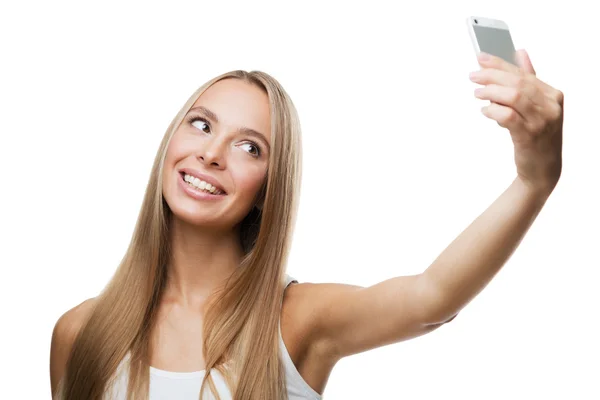 Beautiful woman make selfie on white background Stock Photo