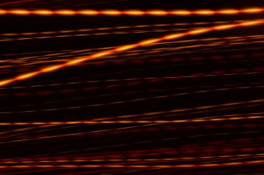 Siyah arkaplanda altın iplikler - kaos içinde altın ve turuncu neonları gösteren soyut grafik arkaplan
