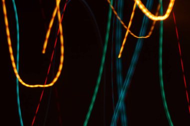 Düzensiz su kurdeleleri ile soyut grafik arkaplan.