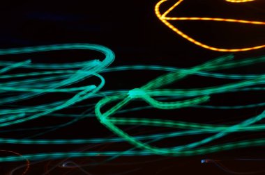 Düzensiz su kurdeleleri ile soyut grafik arkaplan.