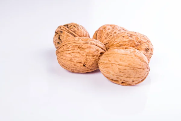 Walnuts on a white background — Stock Photo, Image