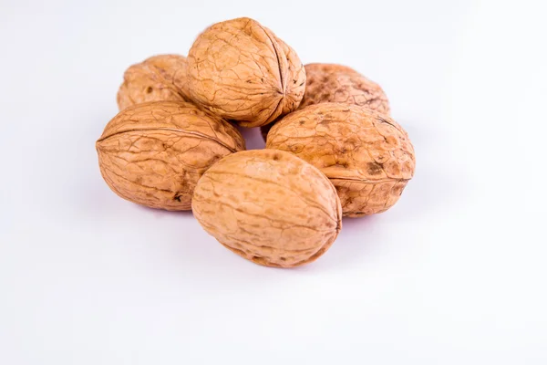 Walnuts on a white background — Stock Photo, Image