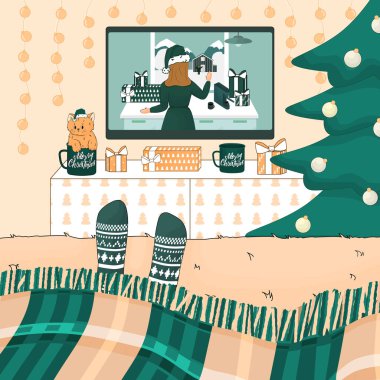 Bir insan Noel 'i izliyor, yeni yıl filmlerini örgü çoraplarla, ekosenin altında. Oda yeşil, şeftali ve beyaz renklerle süslenmiş. Noel ağacı TV masasının yanında.