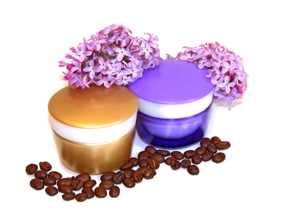 Jar natural cream sprig bloom purple white lilac roasted coffee — Stock Photo, Image