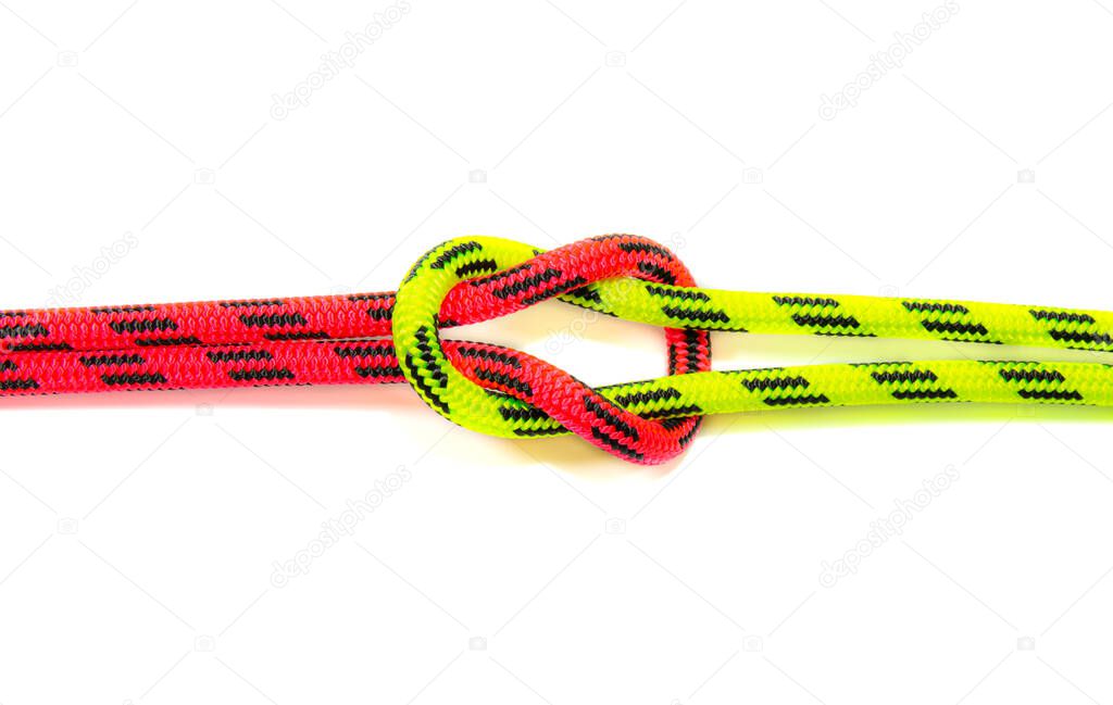 Reef, Hercules, square, double or brother hood Binding knot binding two colored red and green ropes. nautical loop used to secure rope or fishing line around an object. Isolated on white background