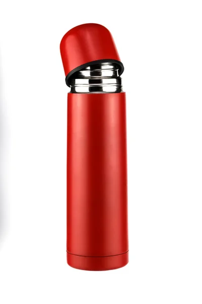 Bright red thermos parted — Stockfoto