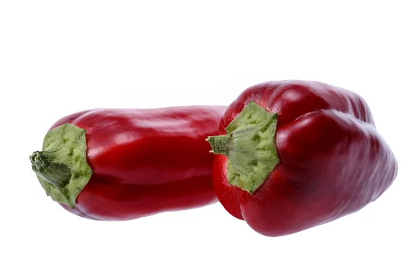 Dvě zralé červené papriky plněné řízky Stock Obrázky