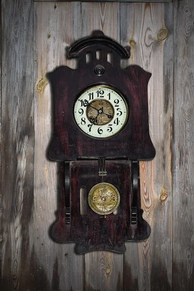 Old clock on the  wooden wall — Stock Photo, Image