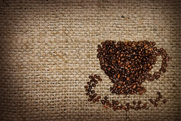 Xícara de café em uma serapilheira — Fotografia de Stock