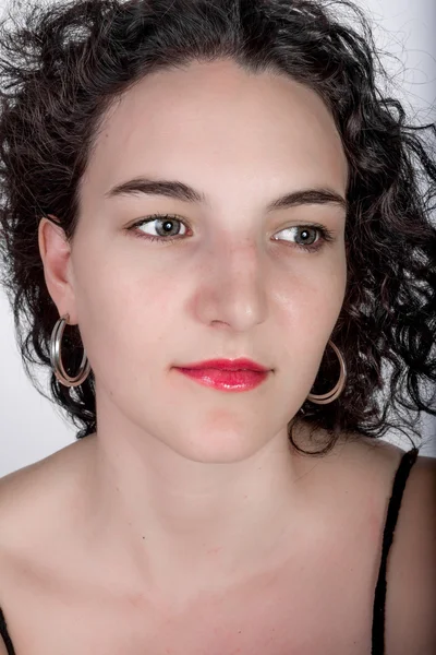 Portrait of a young woman with black hair — Stock Photo, Image