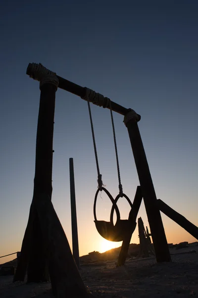 Prázdné Swing při západu slunce — Stock fotografie