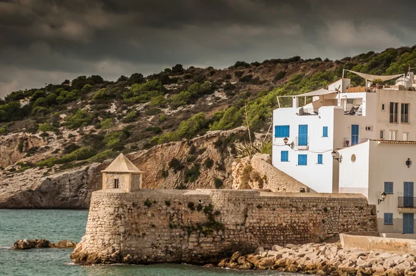 Home on water's edge in Ibiza — Stock Photo, Image
