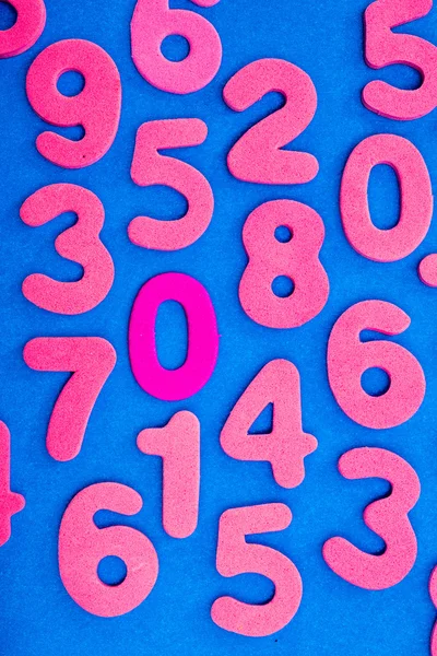 Pink Numbers on Blue Background — Zdjęcie stockowe