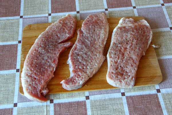 Three Raw Pork Chops Spices Cutting Board — Stock Photo, Image