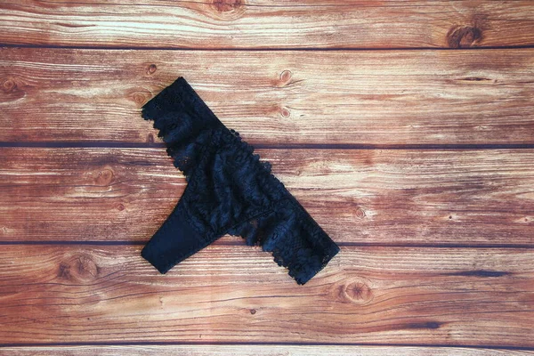 Black Lace Sexy Panties Wooden Background Copyspace — Stock Photo, Image