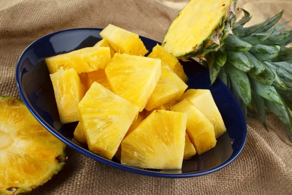 Cut pineapple on dish — Stock Photo, Image