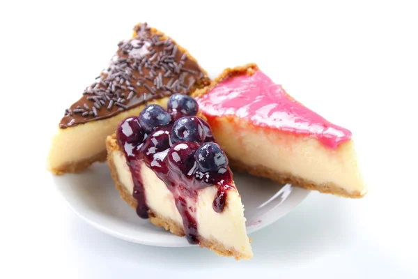 Três fatias de cheesecake — Fotografia de Stock