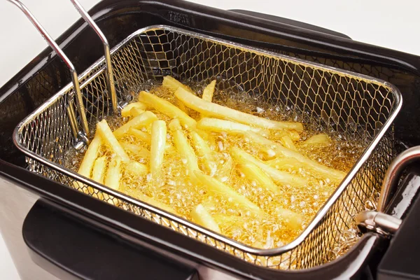 Cooking fries — Stock Photo, Image