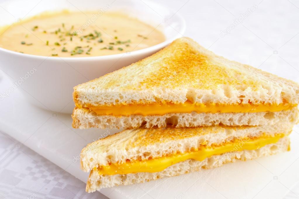 Cheese sandwiches with a bowl of soup
