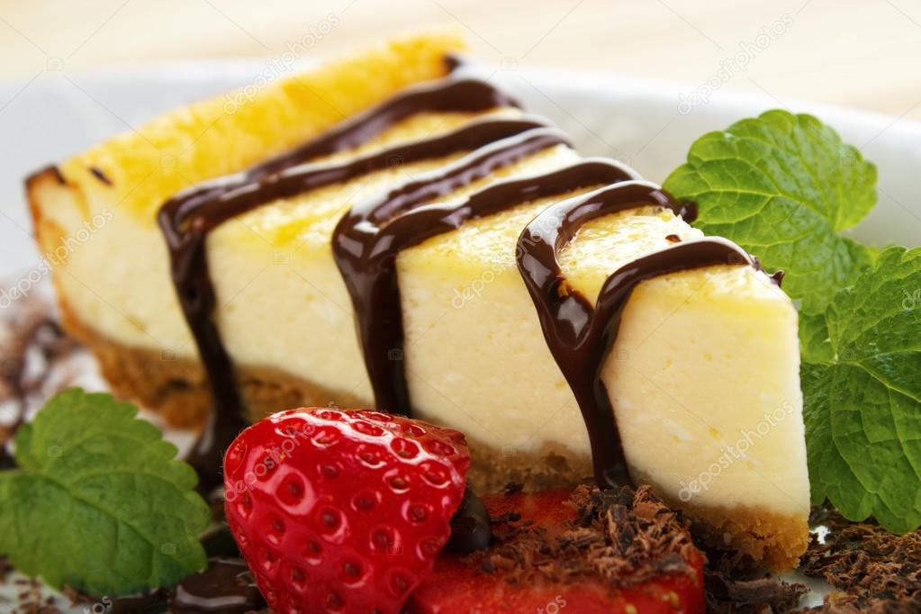 Cheesecake slice and melted chocolate