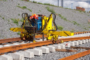 Railroad track installation machine clipart
