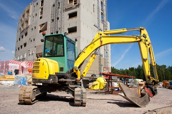 Digger op de bouwplaats — Stockfoto