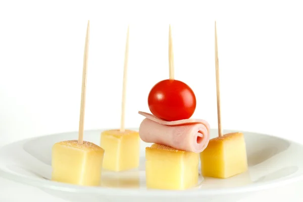 Cheese snacks with cocktail sticks — Stock Photo, Image