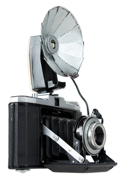 Vintage folding camera with bulb flash — Stock Photo, Image