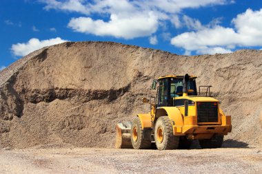 Bulldozer and sand clipart