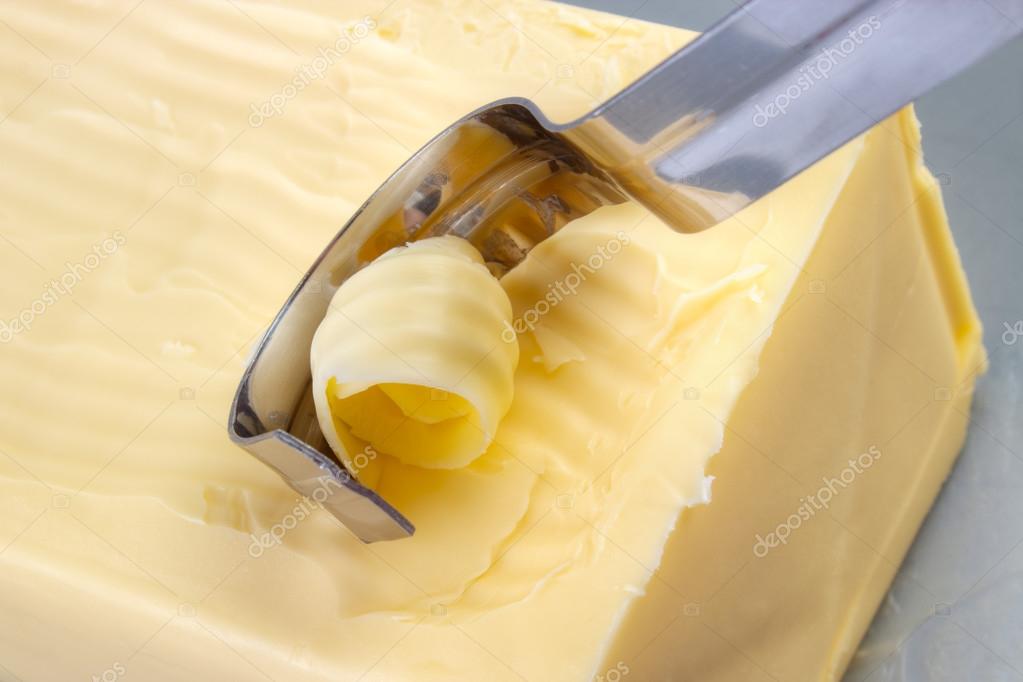 Using butter curler Stock Photo by ©arskajuhani 88095208