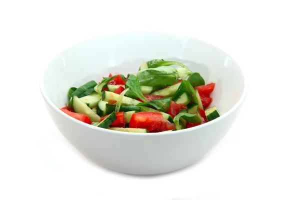 Salade de légumes sur fond blanc — Photo