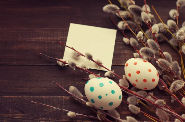 Easter eggs with spring branches of a willow — Stock Photo, Image