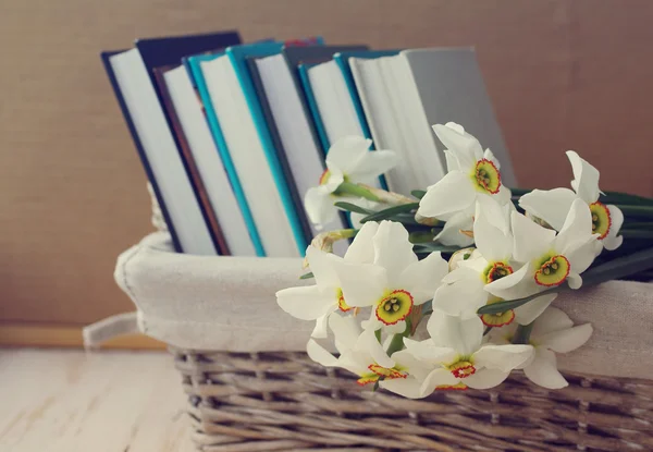 Vintage still life with books and flowers