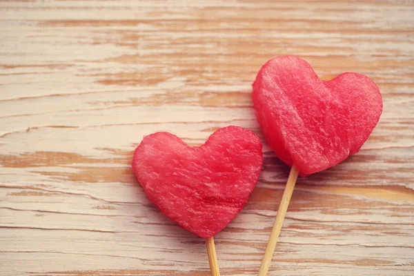 Water-melon cut into heart shape. — Stock Photo, Image