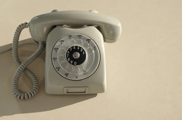 Grå skiva retro telefon — Stockfoto