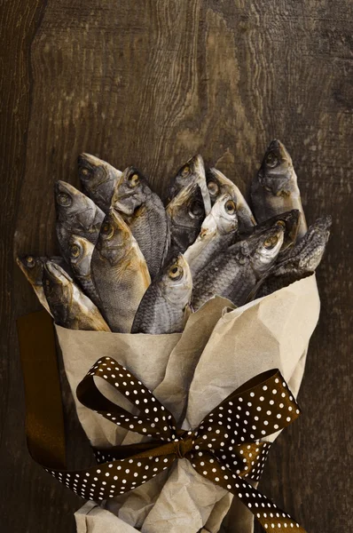 Bouquet from salty dry fish. A gift for men.