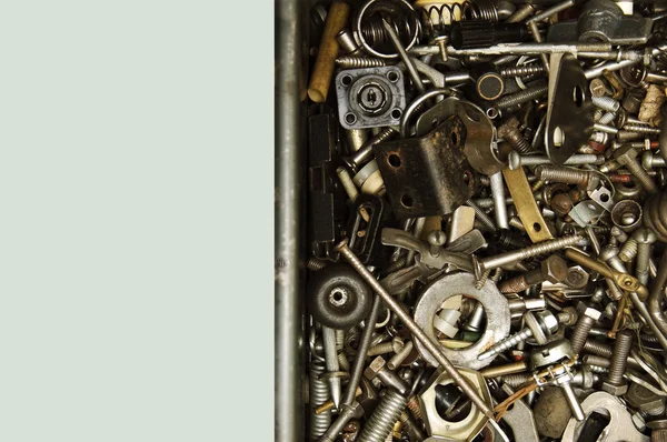 古いさびたボルト、ネジ、ナット、ネジ、ブラケット、様々 な金属の詳細から背景 — ストック写真