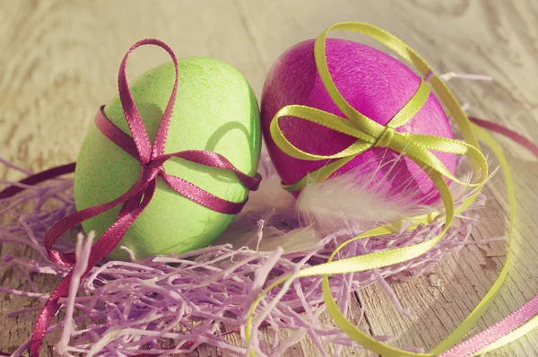 Easter eggs on old wooden background. — Stock Photo, Image