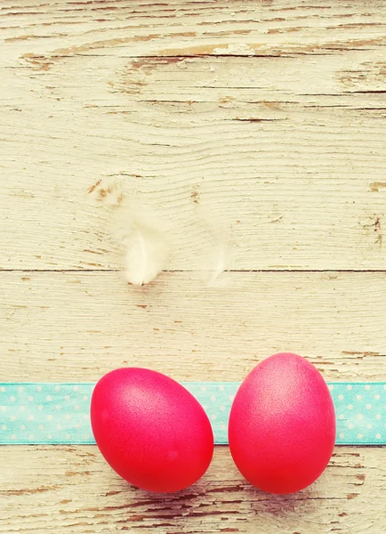 Easter eggs on old wooden background. — Stock Photo, Image